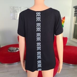 BEBE short sleeve black shirt top with logo vertically down back size L